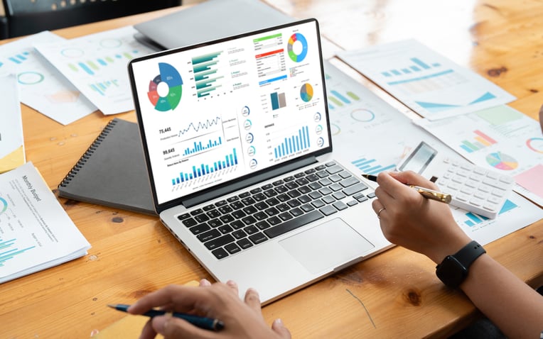 Business team analyzing financial data for the fulfillment industry report