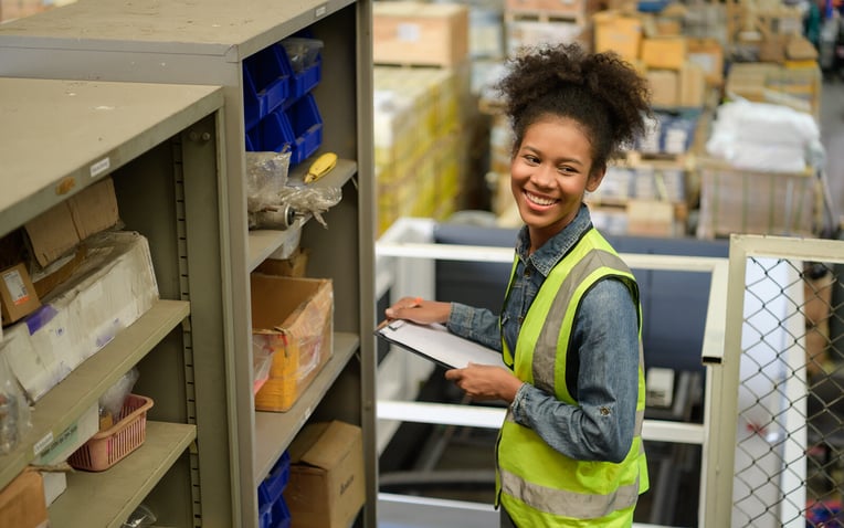 A warehouse worker utilizes the fulfillment services to catalog inventory