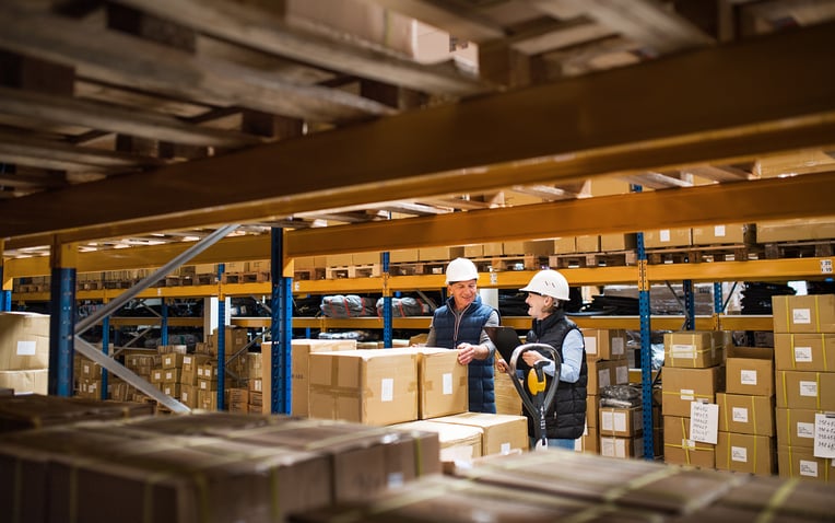 Managers working in a warehouse for the fulfillment center pricing guide 2025
