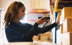 A worker in warehouse for the order fulfillment strategies blog