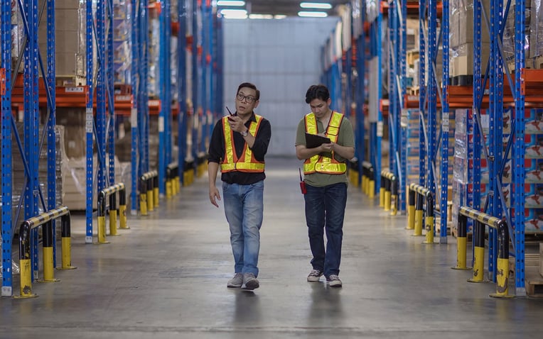 Distribution workers walk through a warehouse for best 3PL companies in the USA