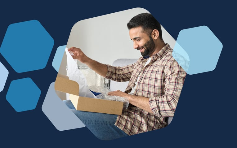 man unboxing package