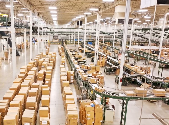 inside of a large fulfillment center warehouse